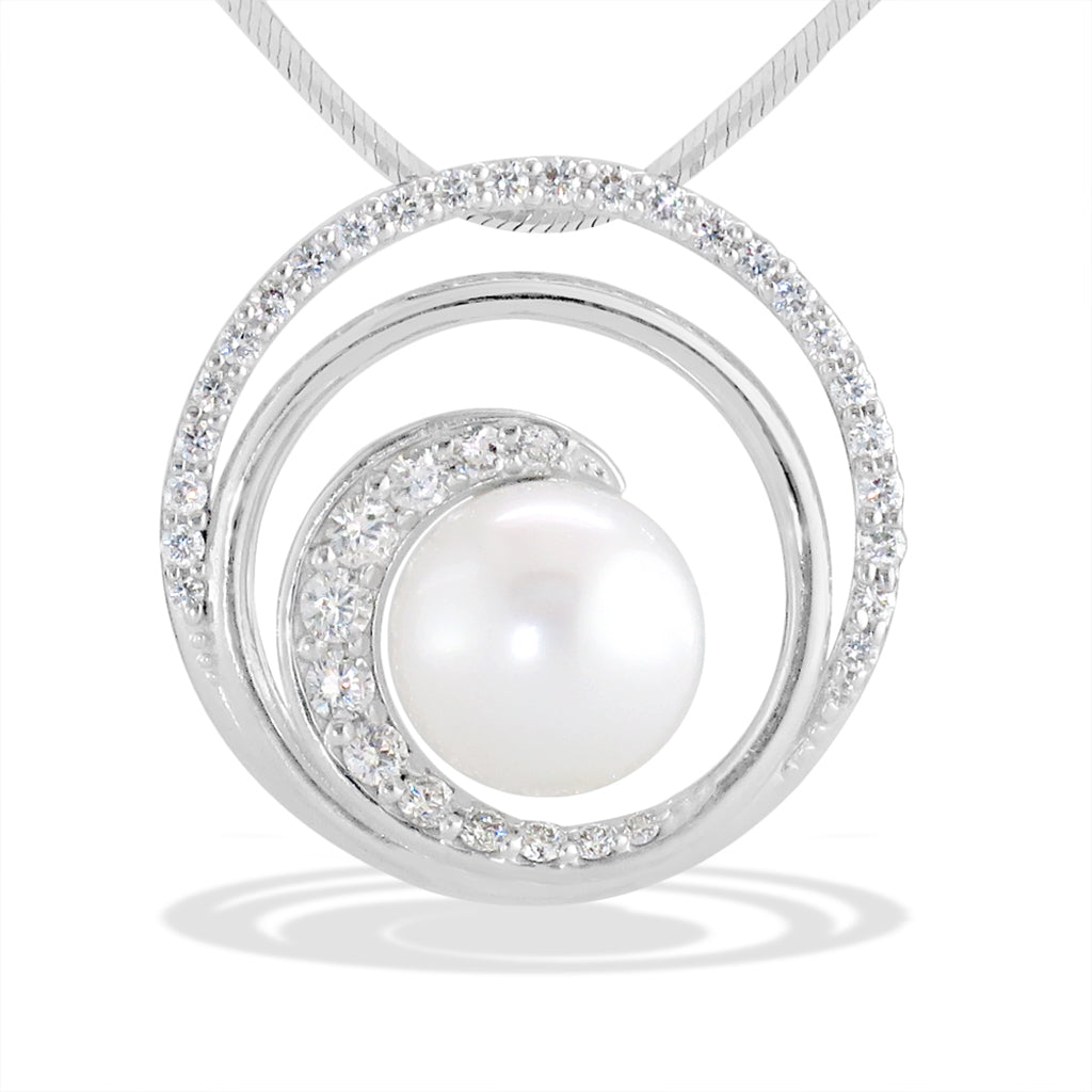 Wave inspired circle pendant in white gold with diamond accents & center white south sea pearl. Item No. 40990