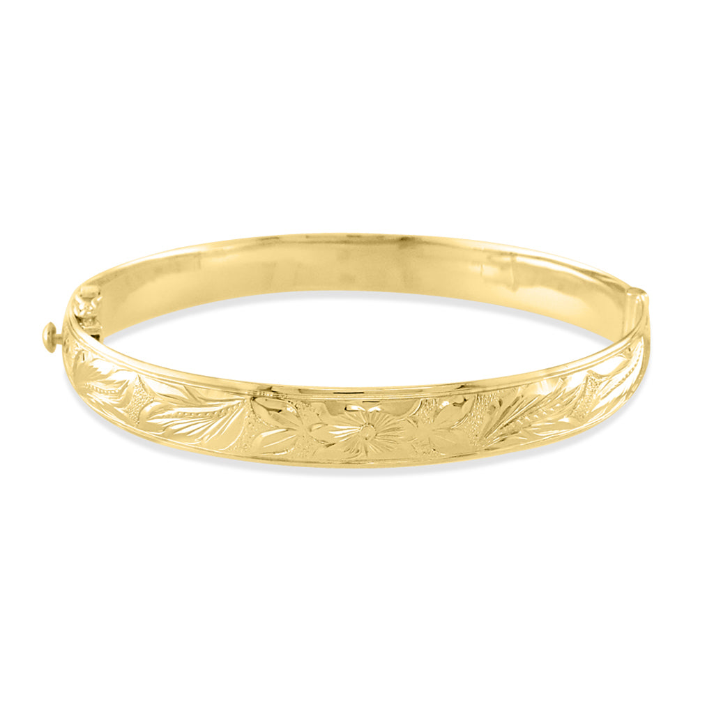 Hawaiian heirloom 14K yellow gold hinged bracelet with hand-engraved plumeria scroll all around. Item No. 65132