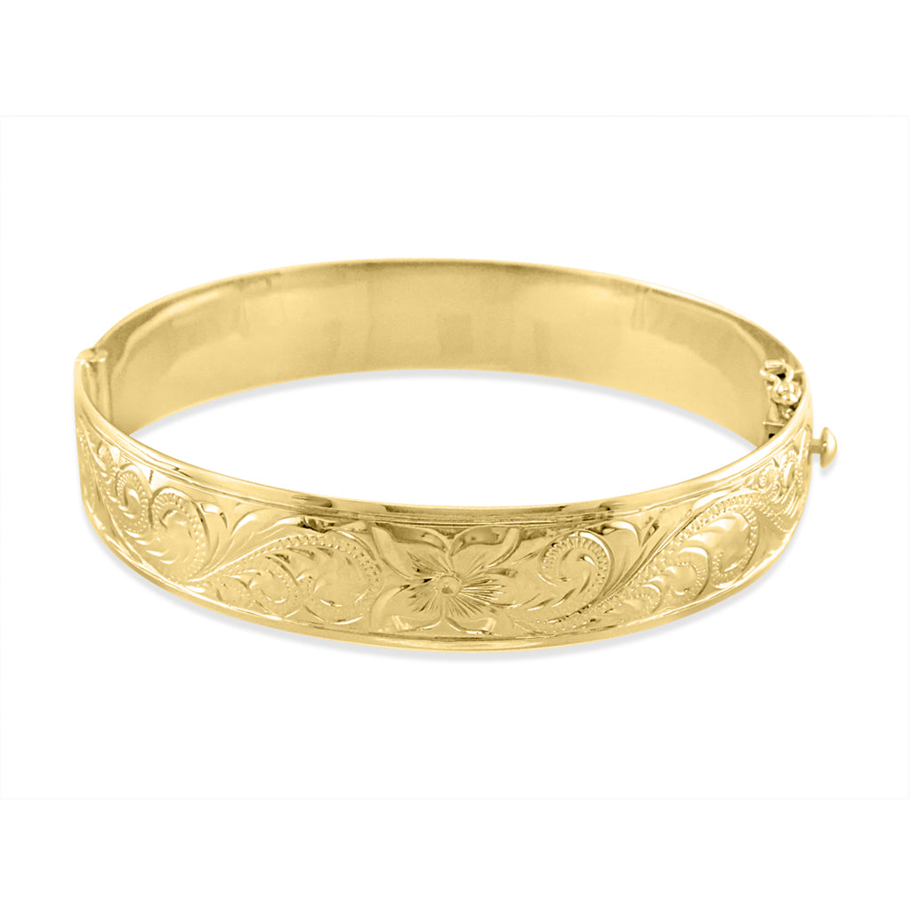 Yellow gold hinged Hawaiian Heirloom bracelet, measuring 12mm wide, with engraved royal scroll design pattern. Item No. 65154