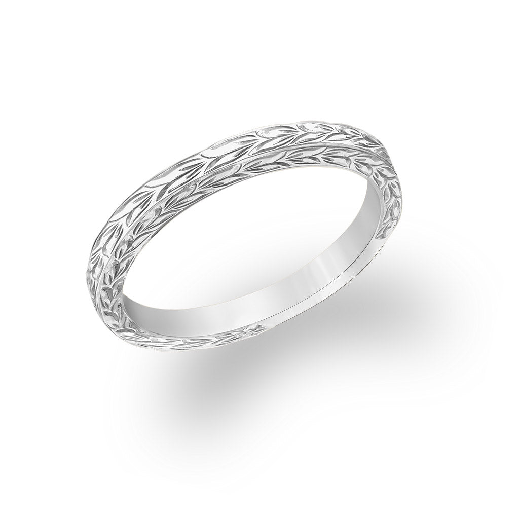 Engraved in 14K white gold, this delicate 2mm maile scroll stacking band is shown in Size 5. Item No. 40686