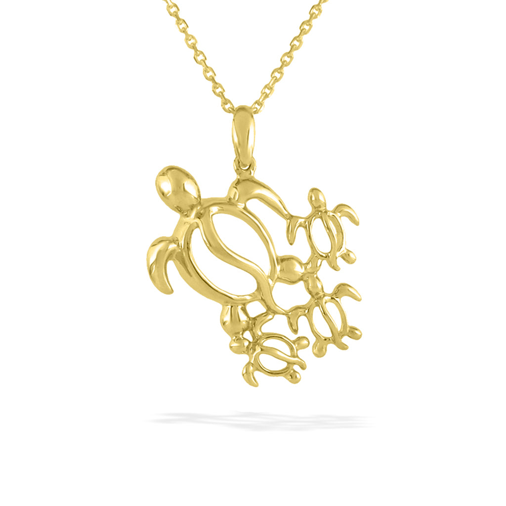 Hawaiian honu ohana pendant made in 14k yellow gold featuring a family of sea turtles on a delicate chain. Item No. 41589