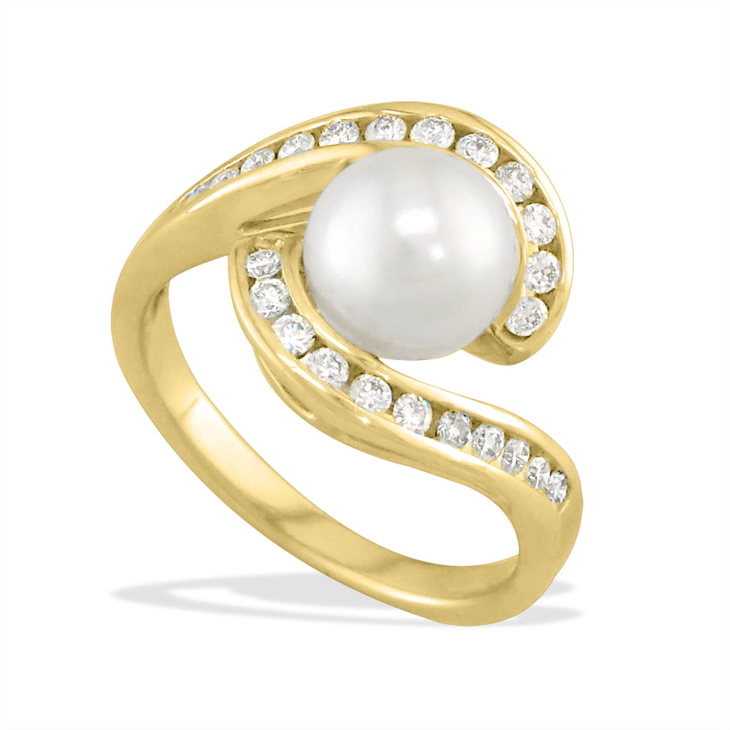 Akoya pearl ring in 14K yellow gold featuring a 7mm white pearl nestled in channel-set diamond swirls. Item No. 40557