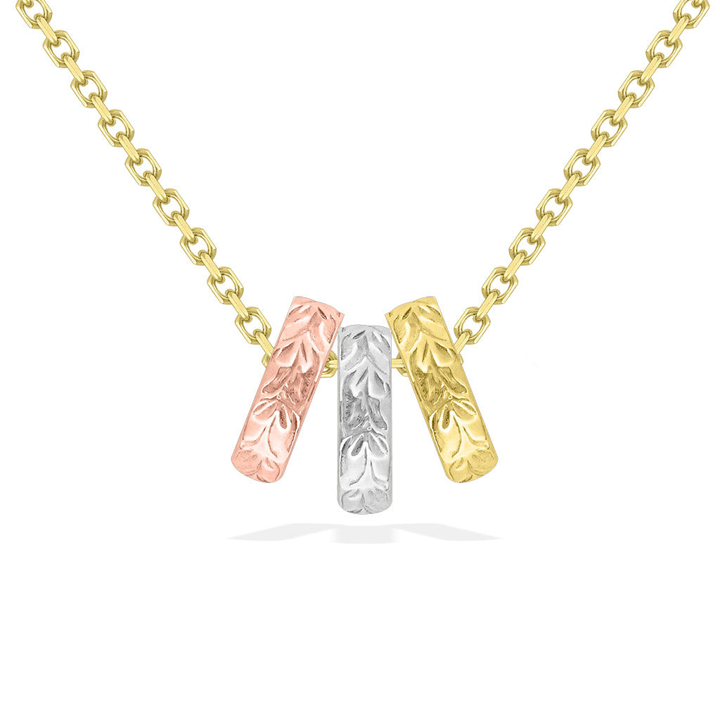 Three tone maile scroll bead pendant in yellow, white, and rose gold on a 17 inch yellow gold chain. Item No. 43153