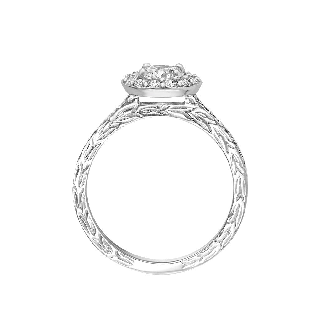 Side view of white gold halo ring, highlighting the maile scrollwork and prong setting for halo. Item No. 43189