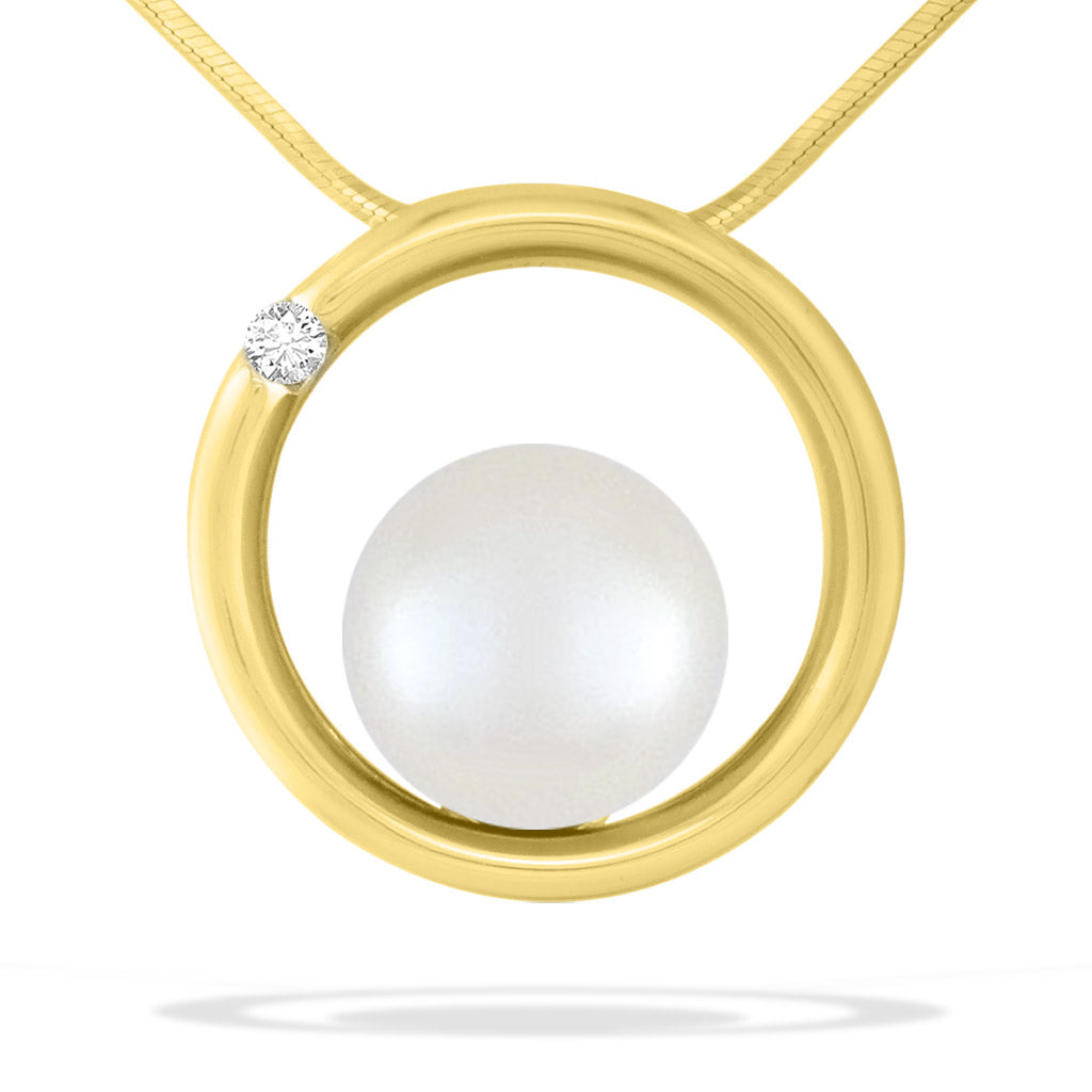 Modern 14K yellow gold circle pendant framing a 12mm White South Sea pearl with delicate diamond detail. Item No. 43814