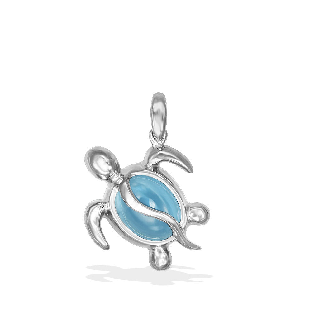 White gold small honu pendant set with a smooth oval blue topaz center and white gold bail. Item No. 43753