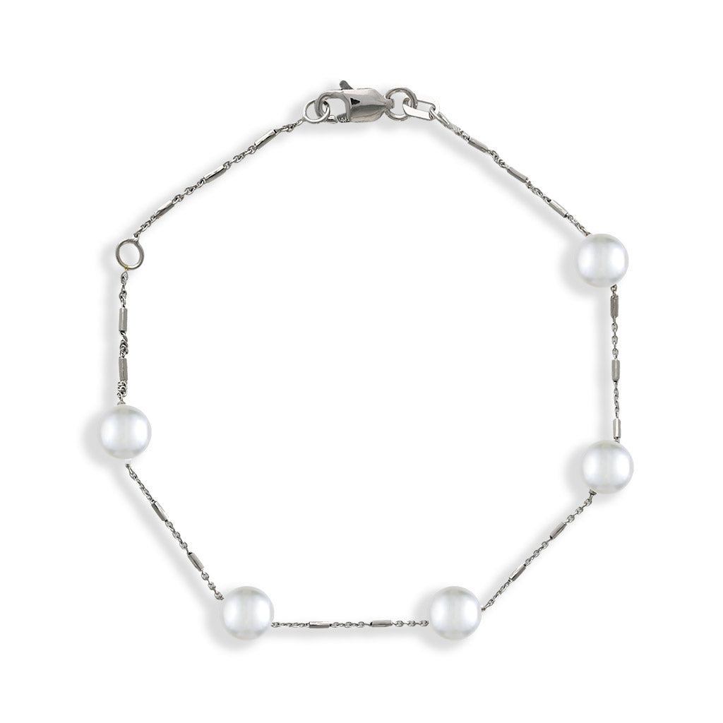 Delicate white gold bracelet with evenly spaced white Akoya pearls along a fine chain and an adjustable clasp. Item No. 44180
