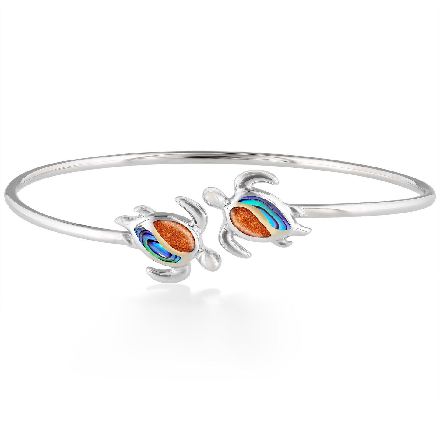 Honu's facing each other with koa, abalone & 18k gold accent shells on sterling silver flexible bypass bangle. Item No. 44217