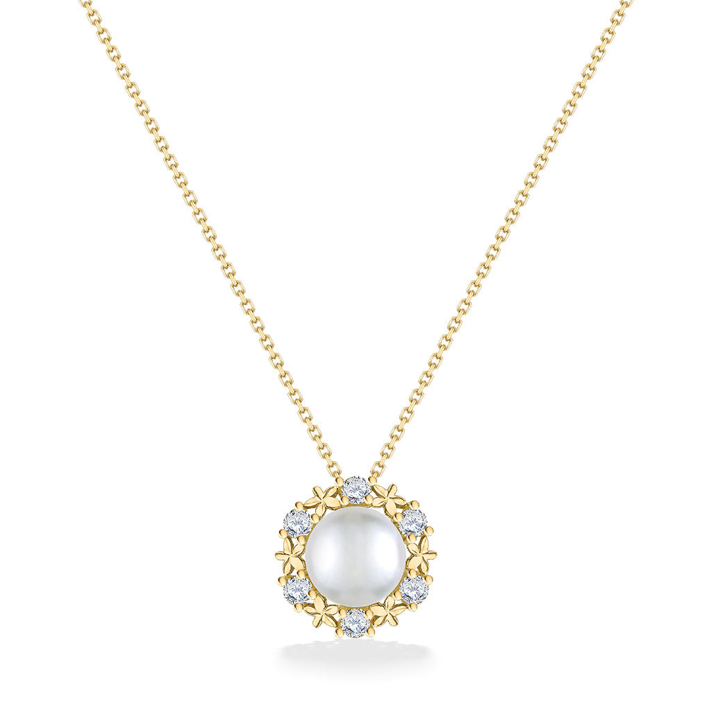 Alternate view of yellow gold floral halo pendant highlighting pearl center and diamond-set plumeria details. Item No. 44307