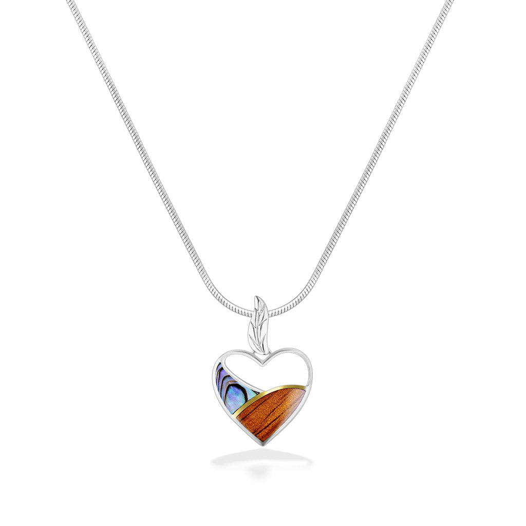 Zoomed out view of the silver heart pendant with abalone & koa wood inlay, highlighting the silver chain. Item No. 44339