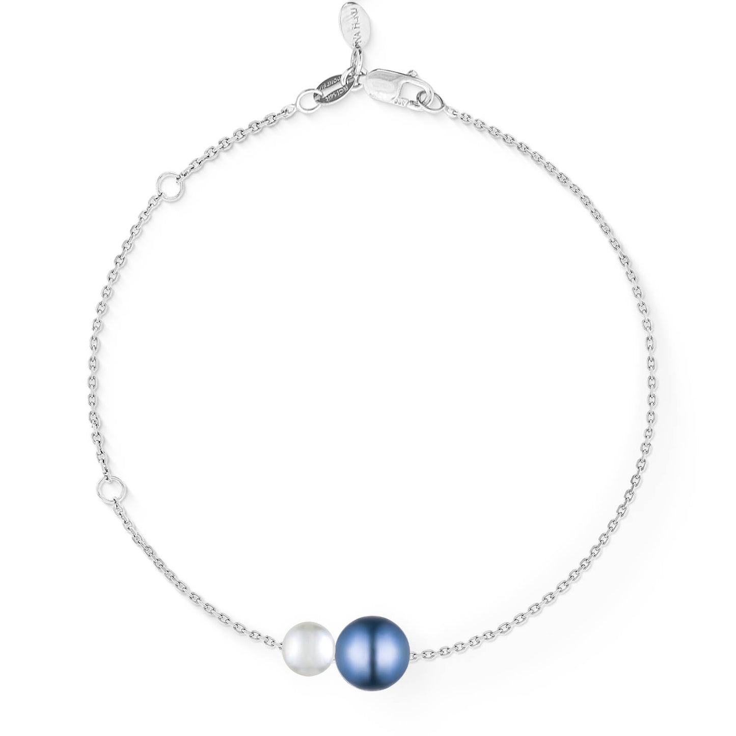 White gold chain bracelet with a white & blue Akoya pearl centered along a delicate adjustable slider design. Item No. 44360