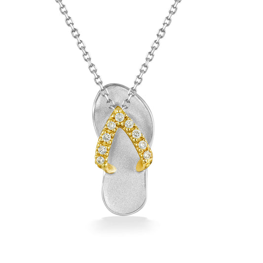 Hawaiian slipper pendant in 14k white gold with diamond encrusted 14k yellow gold straps. Item No. 40540