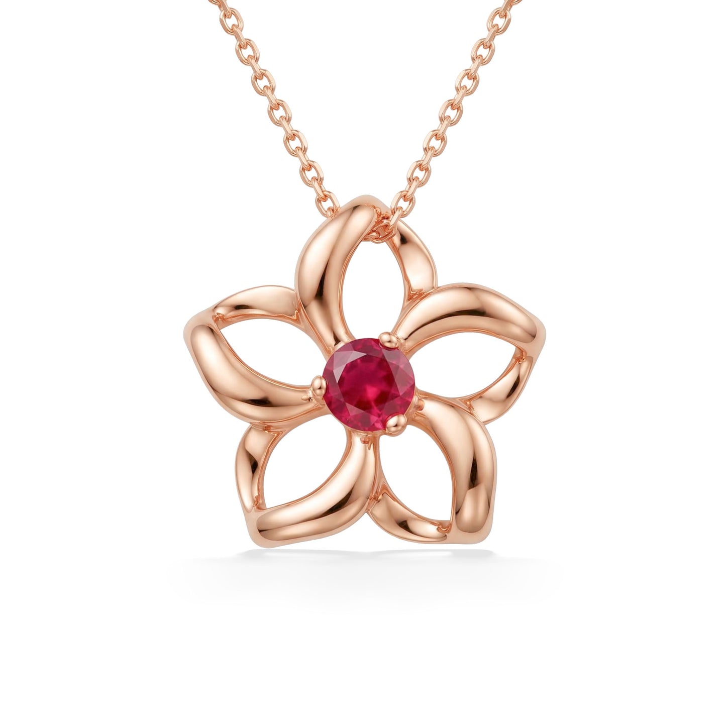 Radiant rhodolite garnet is in the center of a rose gold plumeria pendant with sculpted, open loop petals. Item No. 40030