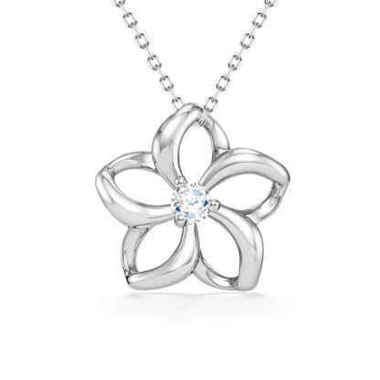 Modern flower outline of the plumeria silhouette in white gold, designed to highlight a diamond at its heart. Item No. 40034
