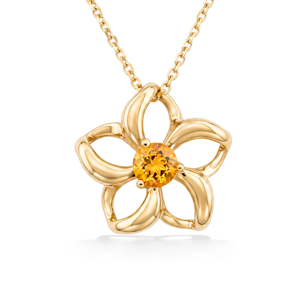 Open-petal flower pendant in yellow gold, highlighted by a citrine gemstone nestled in the center. Item No. 40042