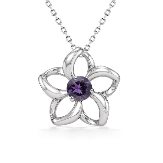 Delicate plumeria pendant with hollow petals in white gold and center amethyst gemstone. Item No. 40049