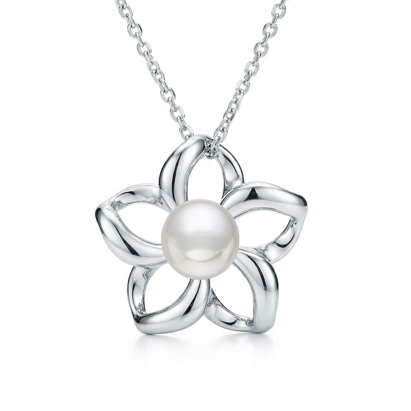 Minimalist floating plumeria charm crafted in gold, centered with a classic round pearl. Item No. 40059