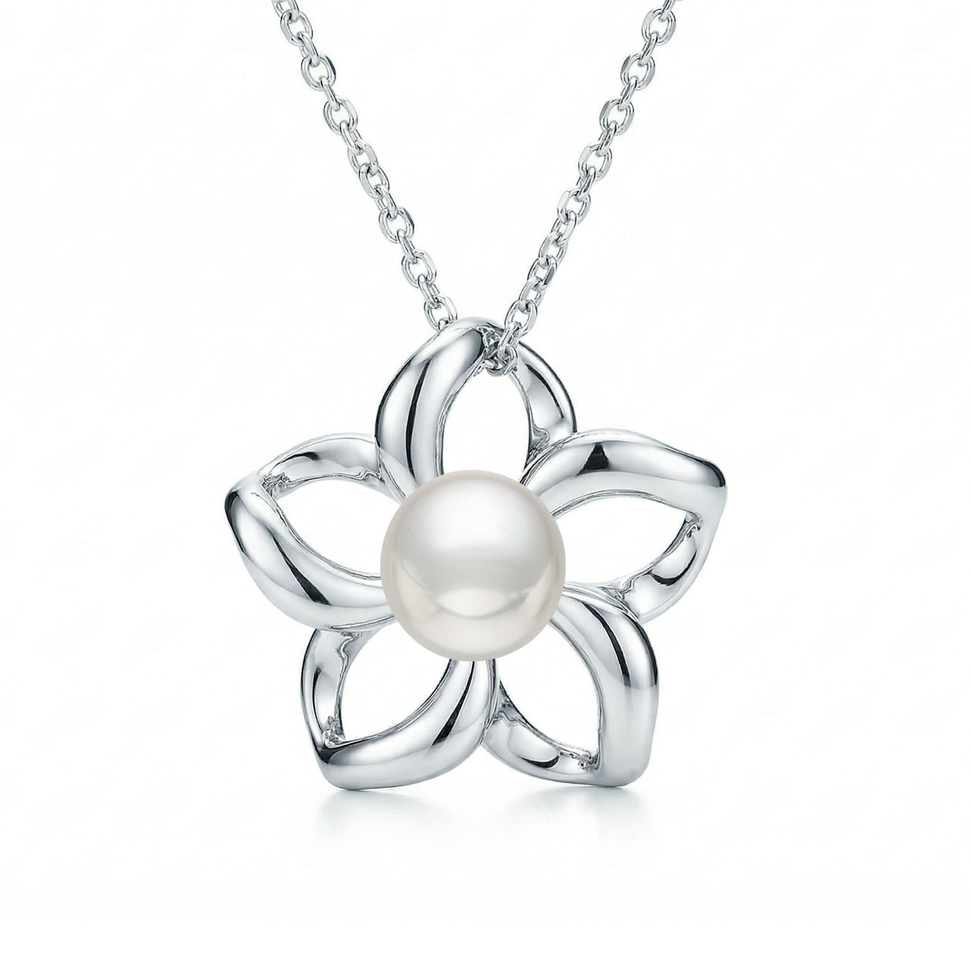 Minimalist floating plumeria charm crafted in gold, centered with a classic round pearl. Item No. 40059