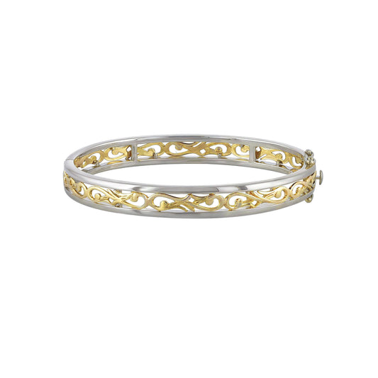 Hinged bangle made in 14K white gold & a centered 14k yellow gold Nalani design. Open box clasp on right side. Item No. 40216
