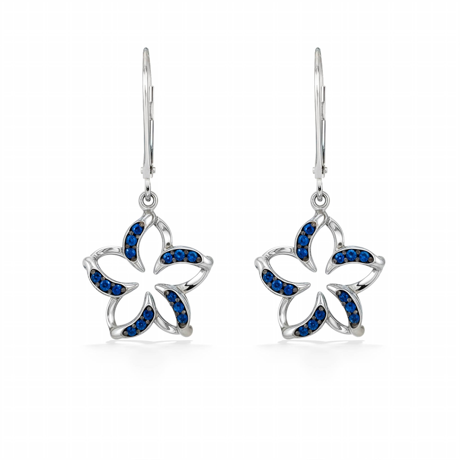 Elegant white gold floating plumeria leverbacks, featuring curved petals set with vivid blue sapphire stones. Item No. 19938