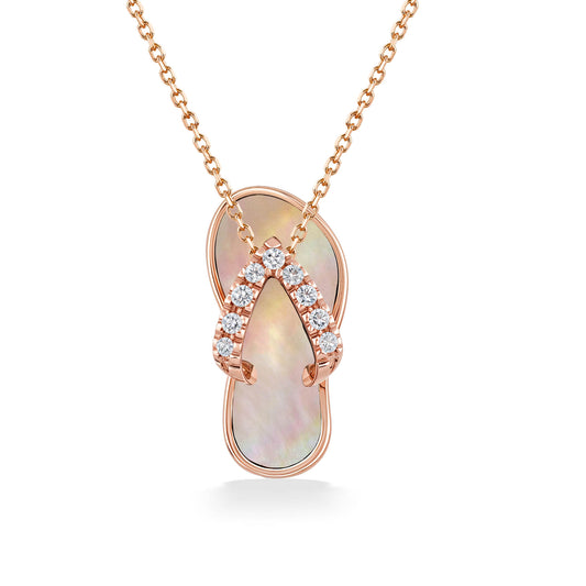 Pendant shaped like a flip flop featuring a luminous pink mother of pearl inlay and diamond-accented straps. Item No. 10807