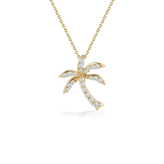 Yellow gold palm tree pendant with 0.19 carats of pavé diamonds suspended from a delicate 17-inch chain. Item No. 10411