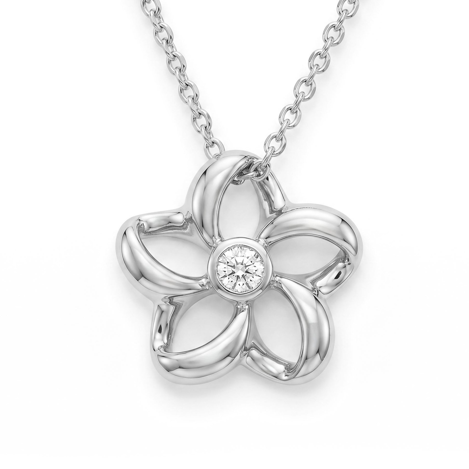 Cute white gold floating plumeria pendant with center diamond in bezel setting, hung on white gold chain. Item No. 18807