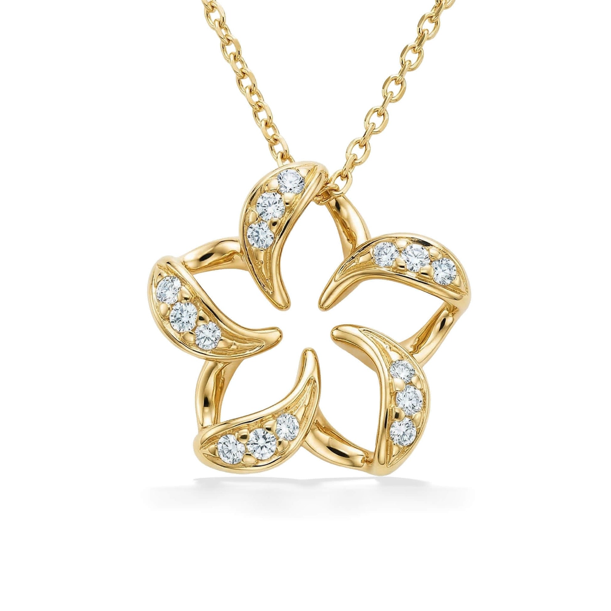 Plumeria Pendant set in 14K yellow gold, measuring 3/4" in width, with diamond accents. Item No. 18849