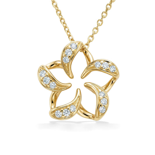 Plumeria Pendant set in 14K yellow gold, measuring 3/4" in width, with diamond accents. Item No. 18849