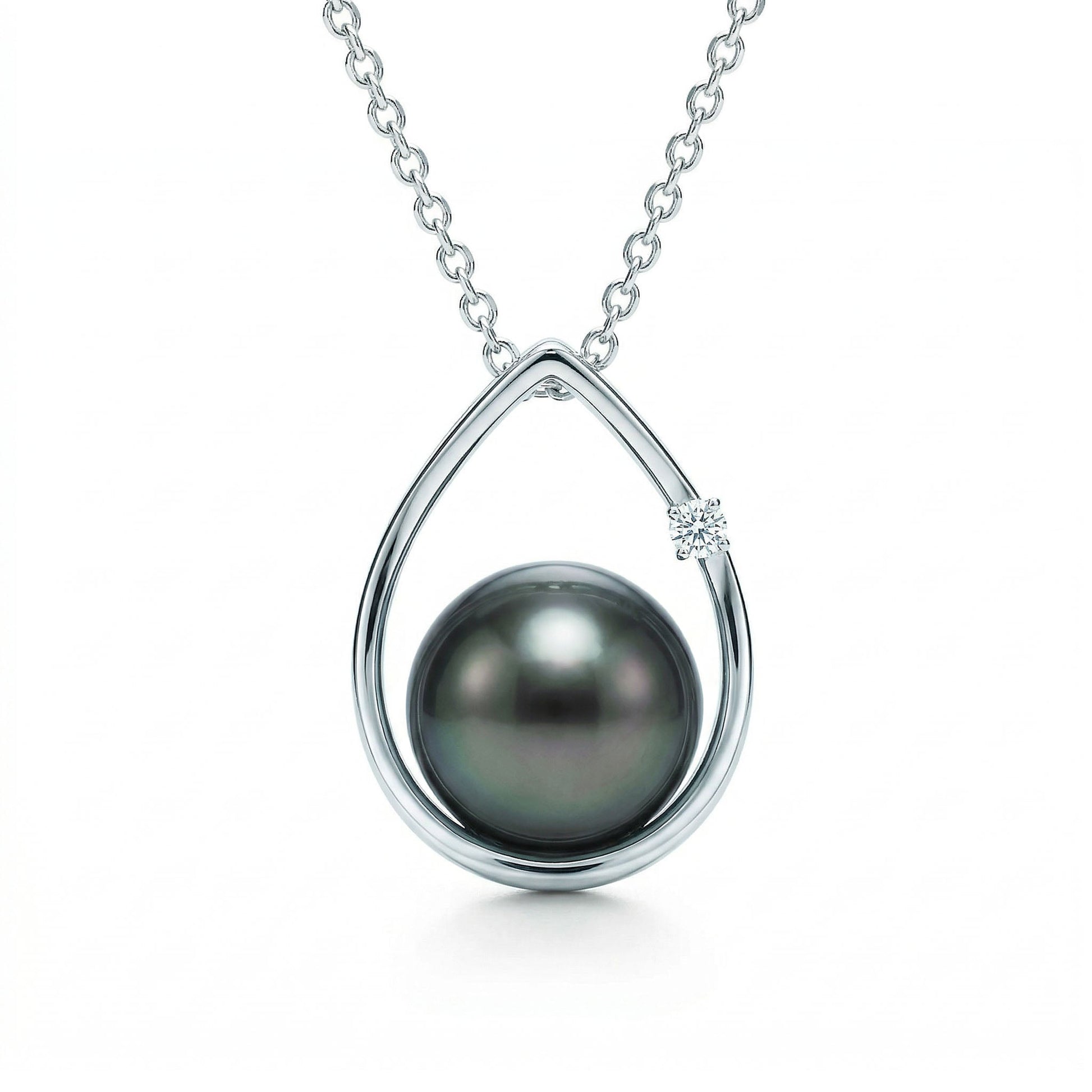 Elegant 14k white gold raindrop pendant with a 8.5-9mm tahitian pearl and single round diamond on box chain. Item No. 19153