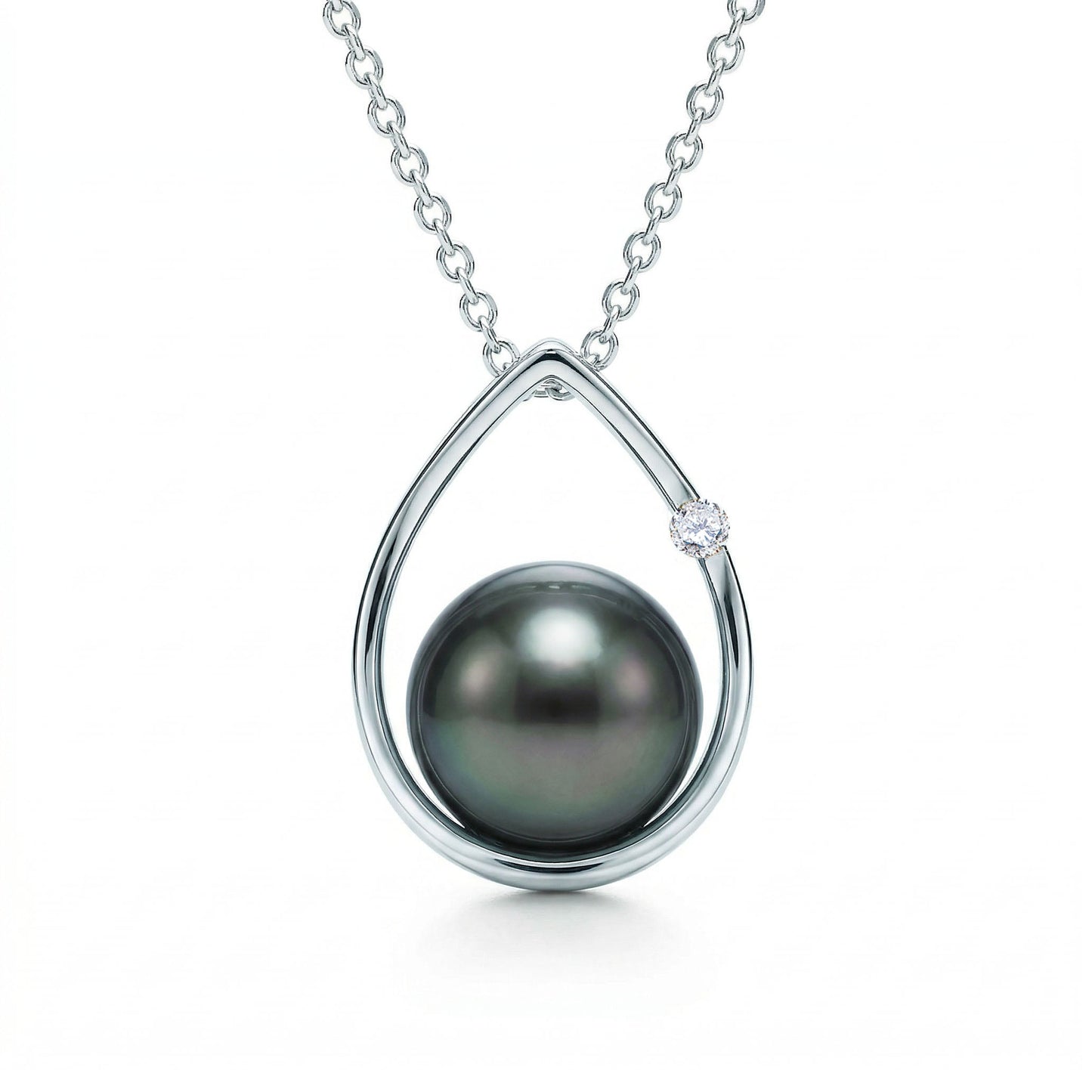 Elegant 14k white gold raindrop pendant with a 8.5-9mm tahitian pearl and single round diamond on box chain. Item No. 19153