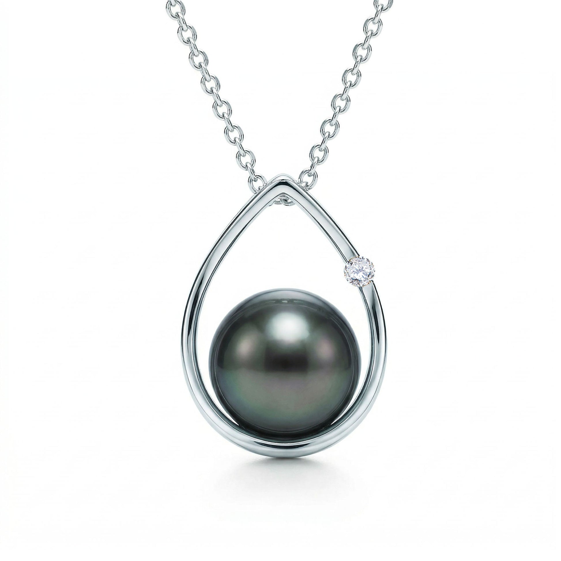 Elegant 14k white gold raindrop pendant with a 8.5-9mm tahitian pearl and single round diamond on box chain. Item No. 19153