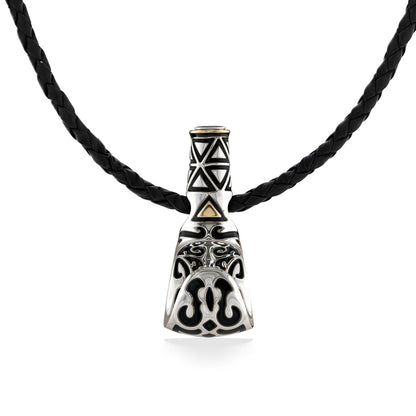 Sterling silver palaoa pendant with tribal engravings and 18k gold accents on a braided leather cord. Item No. 41528