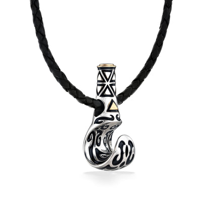 Side view of the palaoa pendant, highlighting the details of the tribal engravings in every curve. Item No. 41528