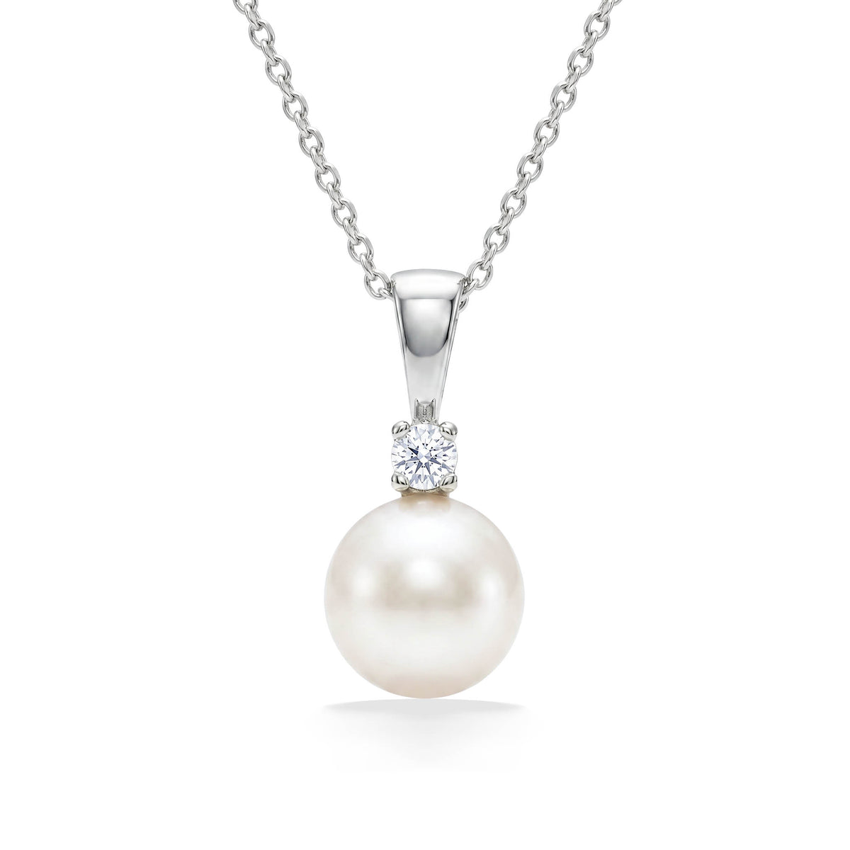Luminous 7mm round white Akoya pearl pendant with a diamond accent on a delicate matching chain. Item No. 41234