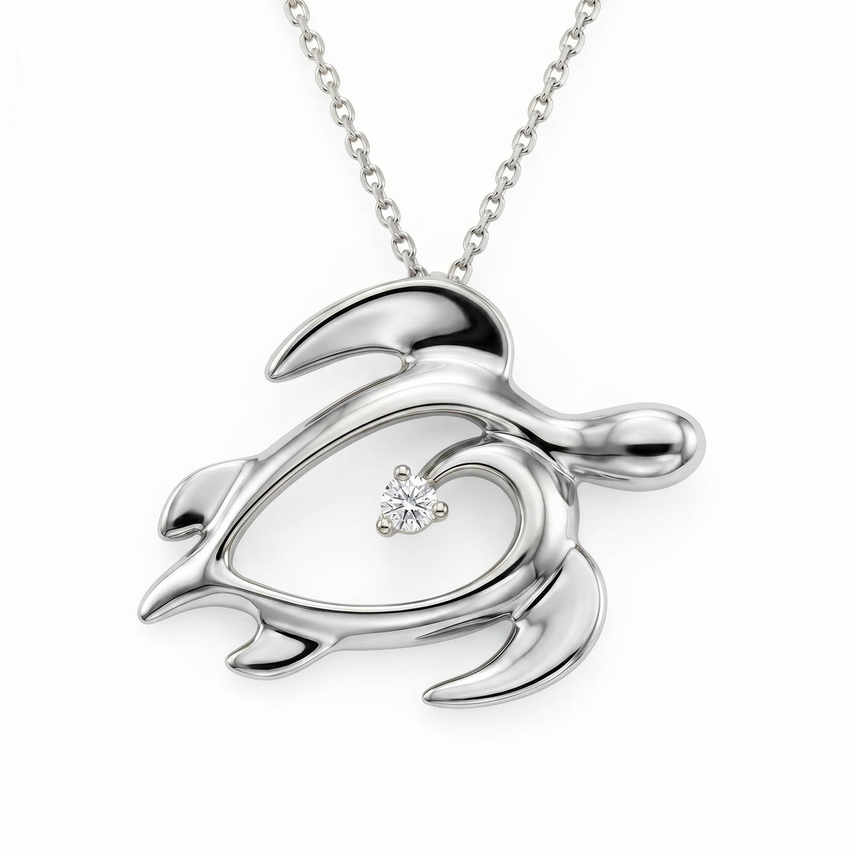 White gold Honu (Hawaiian Sea Turtle) pendant with heart-shaped hollow middle and diamond center. Item No. 41052 