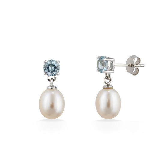 Sterling silver drop earrings with round blue topaz studs and teardrop-shaped white freshwater pearl dangles. Item No. 700734