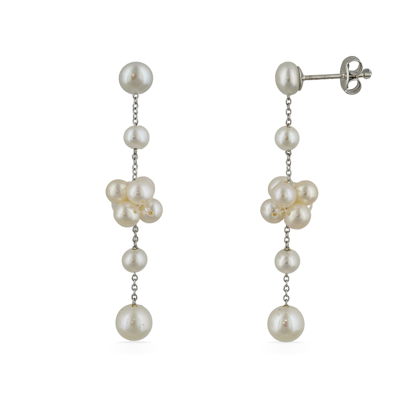 A pair of dangling earrings made with cascading white freshwater pearls connected by delicate silver chains. Item No. 700693