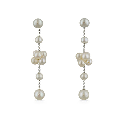 Front view of elegant freshwater pearl drop earrings with clusters of pearls suspended on fine silver chains. Item No. 700693