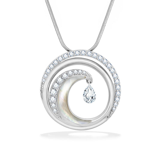 Large circular pendant with pavé-set diamonds & mother-of-pearl inlay in wave design with a dangling shimmer. Item No. 40821