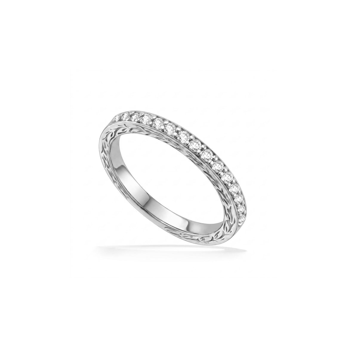 White gold ring with pavé-set diamonds on top and detailed Maile scrolls along the polished band. Item No. 40783