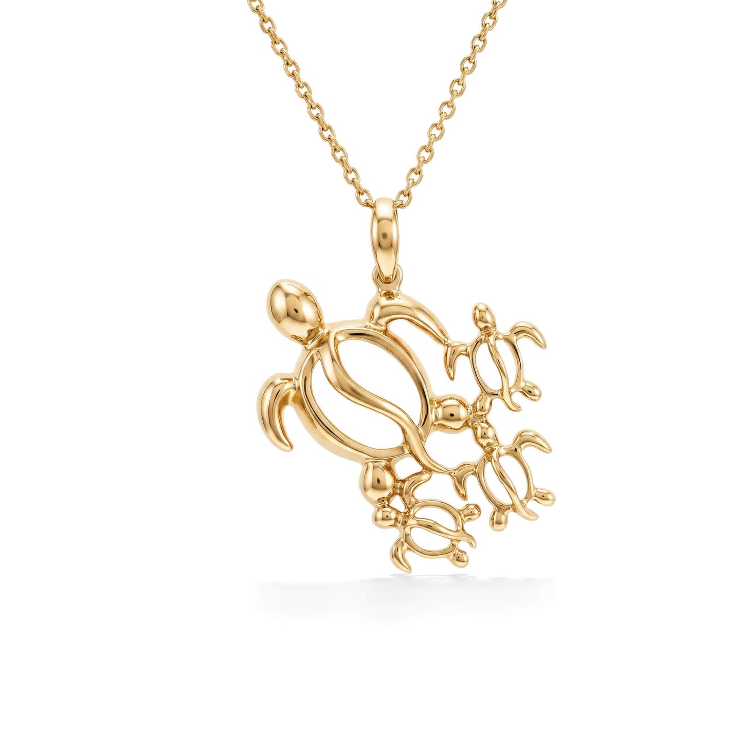 Hawaiian honu ohana pendant made in 14k yellow gold featuring a family of sea turtles on a delicate chain. Item No. 41589