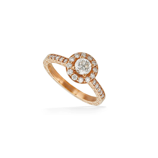 Rose gold ring featuring a round halo diamond setting, vintage maile scrollwork, and shimmering side stones. Item No. 43187