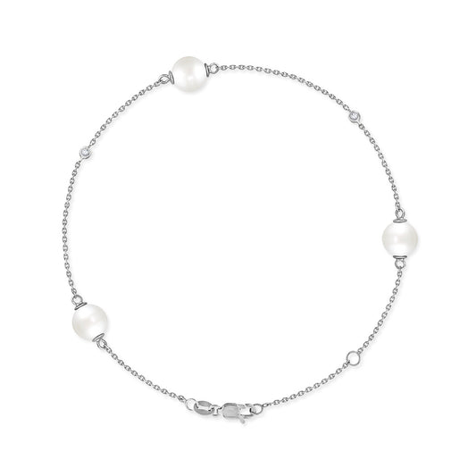 White Akoya pearl bracelet with alternating pearl and bezel-set diamonds on a 14k white gold chain. Item No. 43314