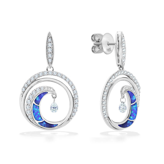 Partial view of white gold Ultimate Wave Dangle Earrings. Opal inlay, center shimmer & surrounding diamonds. Item No. 43407