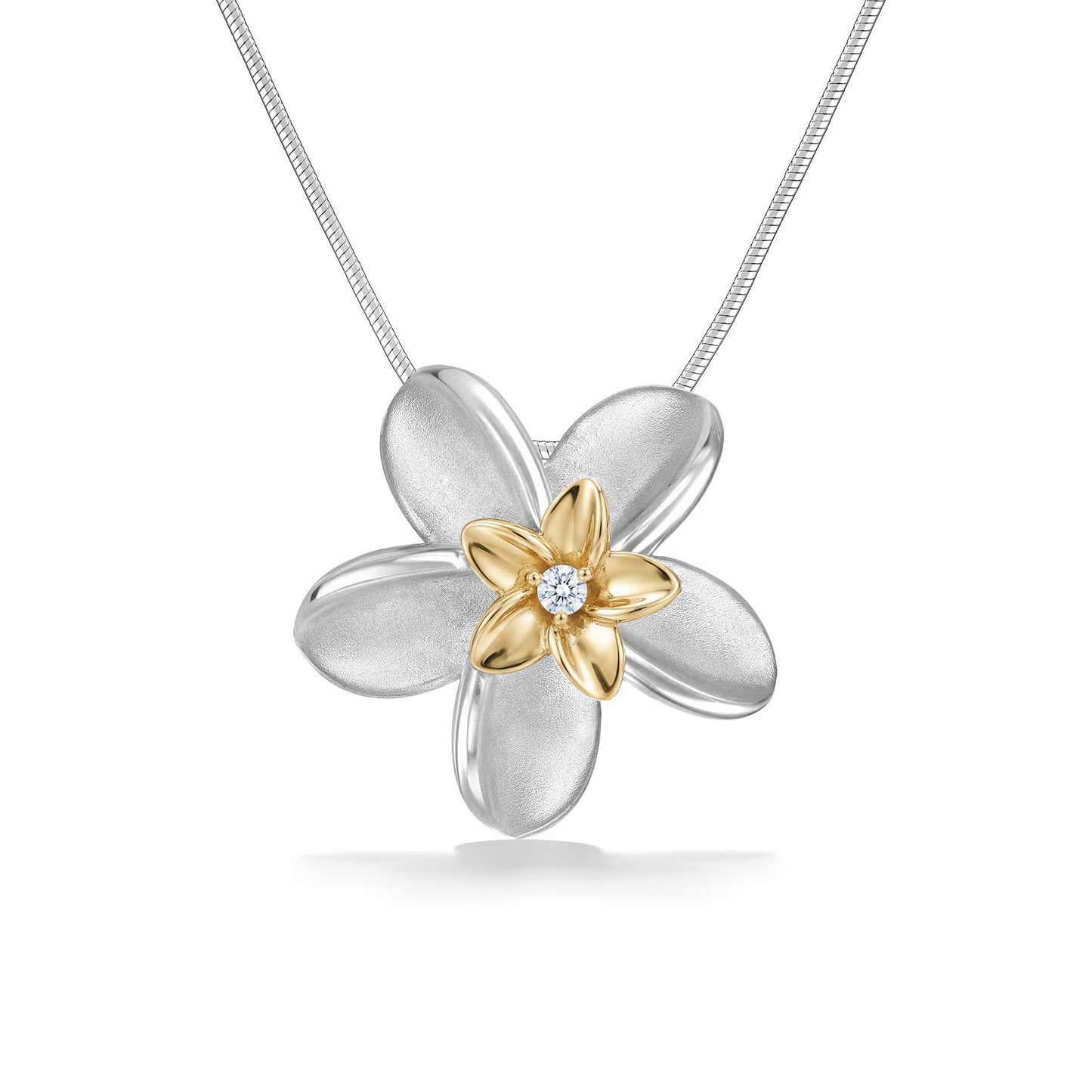 Double plumeria pendant with a yellow gold plumeria & center diamond, resting on the sterling silver plumeria. Item No. 44170