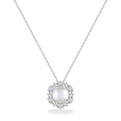 Front view of white gold pearl pendant showcasing diamond accents arranged in a plumeria-style halo. Item No. 44308