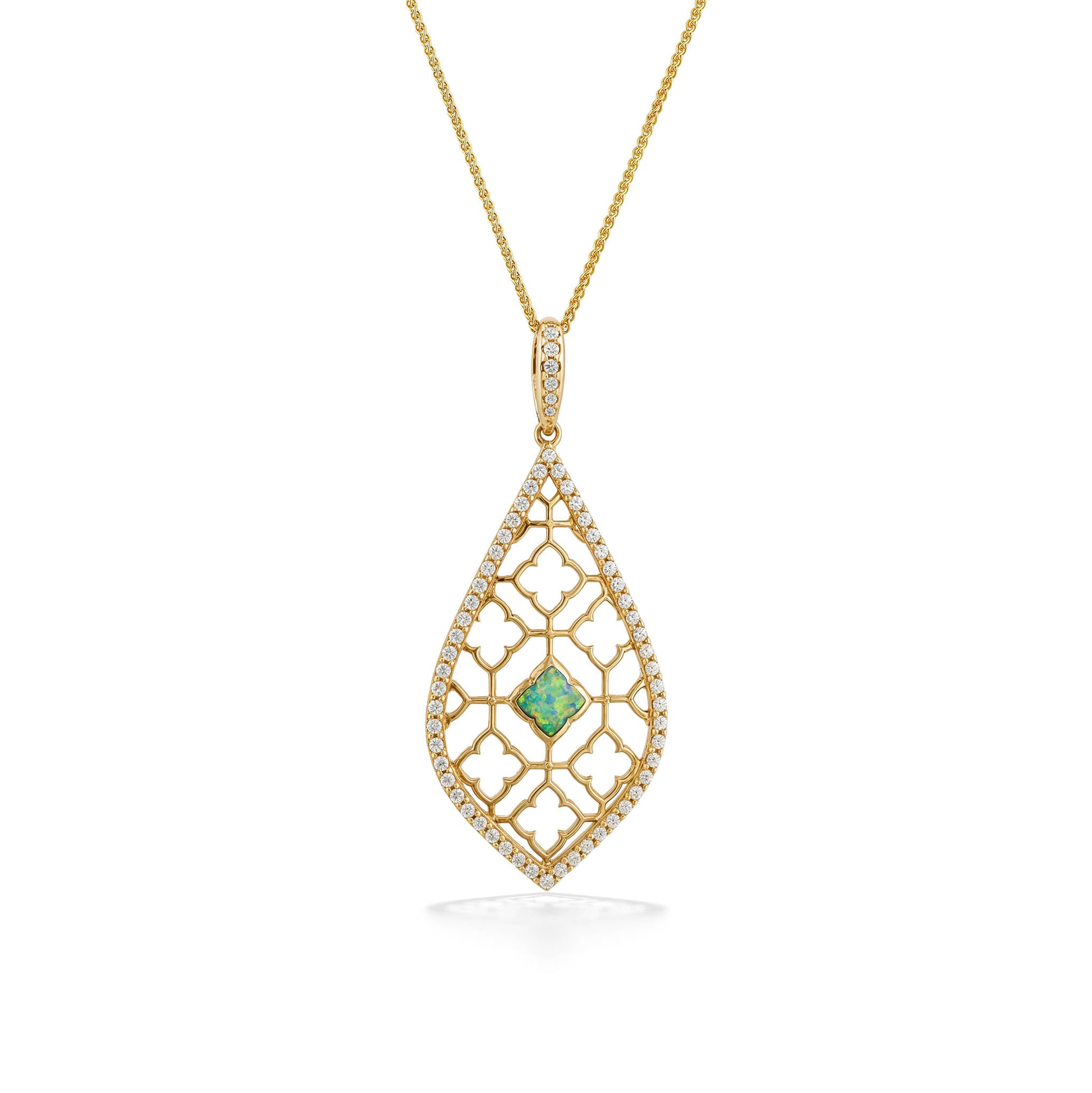 Gold pendant with a delicate, elegant filigree design, lined with diamonds & a radiant opal centerpiece. Item No. 772965