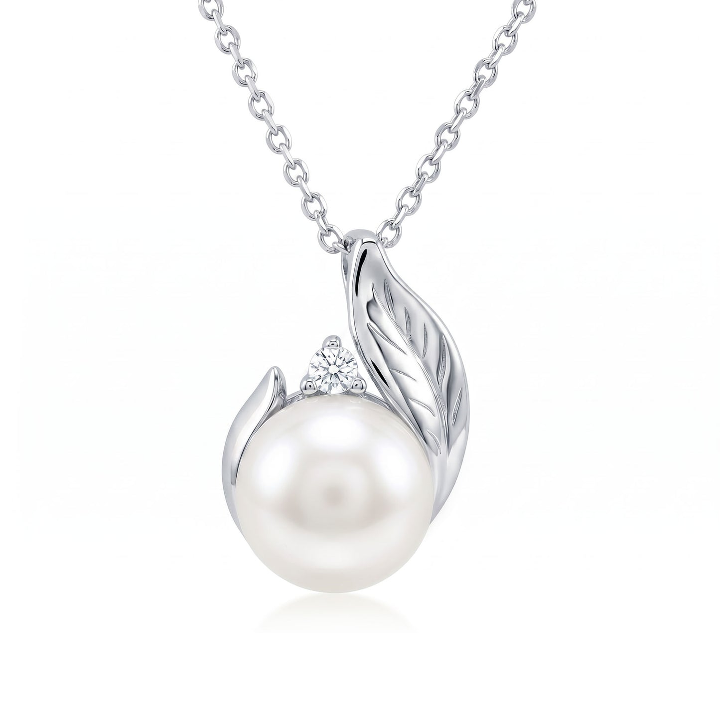 White gold maile leaf pendant showcasing a 7mm Akoya pearl and 0.03 carat diamond with matching chain. Item No. 44557