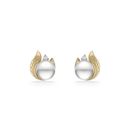 Yellow gold stud earrings with sculpted maile leaf design, accented by white akoya pearls & subtle diamond. Item No. 44558
